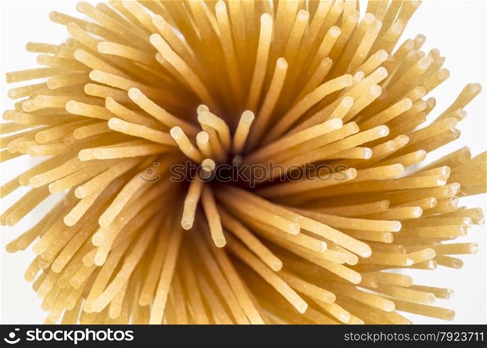 gluten free, brown rice pasta, spaghetti style - top view at a bunch of uncooked noodles