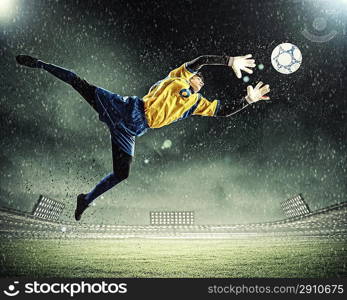 Goalkeeper catches the ball