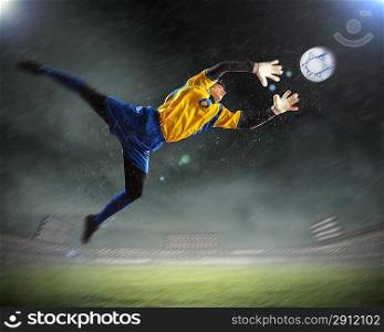 Goalkeeper catches the ball