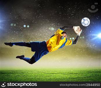 Goalkeeper catches the ball