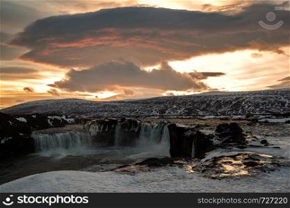 Godafoss waterfall at sunset in winter, Iceland. Godafoss waterfall at sunset, Iceland