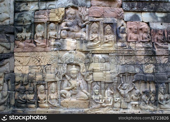 Gods on the wall, Angkor, Cambodia