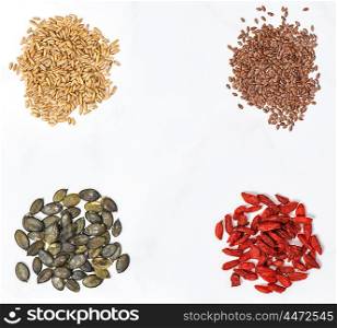 Goji berries, oats, linseed, pumpkinseed. Healthy superfoods. Clean eating. Detox. Food background with space for your text