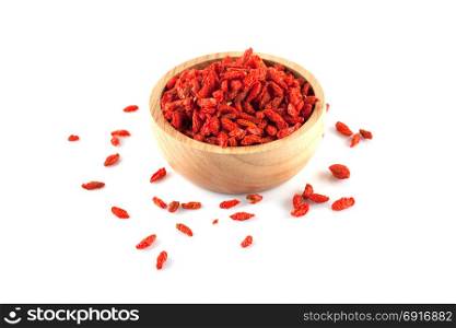 Goji berry in wooden bowl isolated on white background