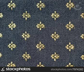 Gold and black floral fabric background