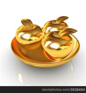 Gold apples on a plate