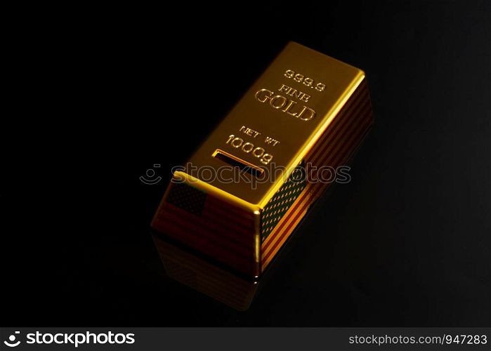 Gold bar with USA flag on black background.. Gold bar with USA flag.