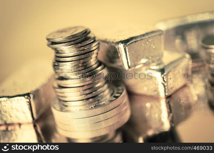 Gold bars and stack of gold coins macro. Rows of coins and gold ingots for finance and banking concept. Economy trends background for business idea. Trade in precious metals. Close up,Selective focus.. Gold bars and stack of gold coins. Background for finance banking concept. Trade in precious metals.