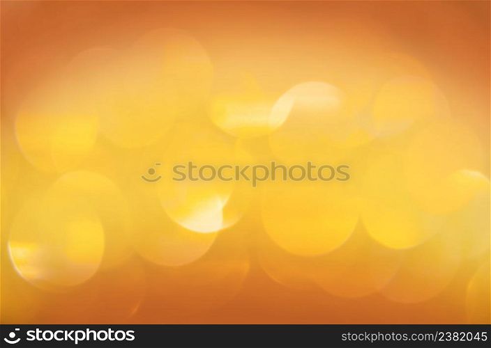 Gold bokeh background. Abstract blur gold bokeh. Wide format banner. Christmas glittering bokeh stars background