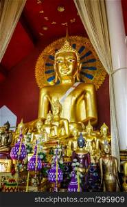 Gold Buddha statue in Wat Phra Singh temple, Chiang Mai, Thailand. Buddha statue in Wat Phra Singh temple, Chiang Mai, Thailand
