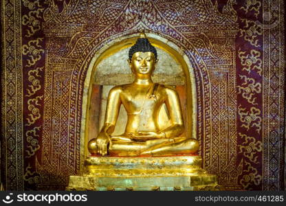 Gold Buddha statue in Wat Phra Singh temple, Chiang Mai, Thailand. Buddha statue in Wat Phra Singh temple, Chiang Mai, Thailand