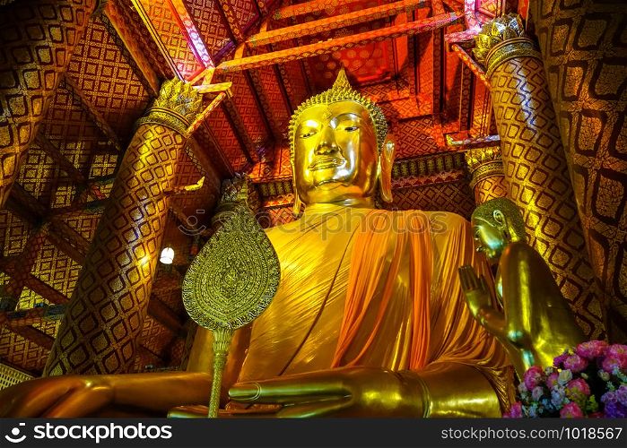 Gold Buddha statue, Wat Phanan Choeng temple, Ayutthaya, Thailand. Gold Buddha statue, Wat Phanan Choeng, Ayutthaya, Thailand