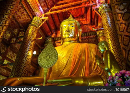 Gold Buddha statue, Wat Phanan Choeng temple, Ayutthaya, Thailand. Gold Buddha statue, Wat Phanan Choeng, Ayutthaya, Thailand