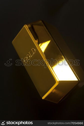 Gold bullion on black background