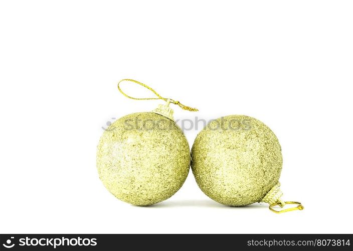 Gold Christmas ball on white background. close up.