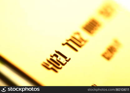 Gold credit cards close-up. Shalow DOF!