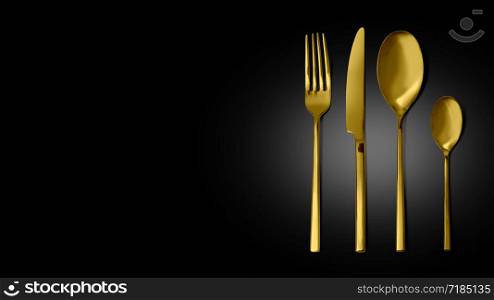 Gold cutlery set with Fork, Knife and Spoon isolated, with clipping path