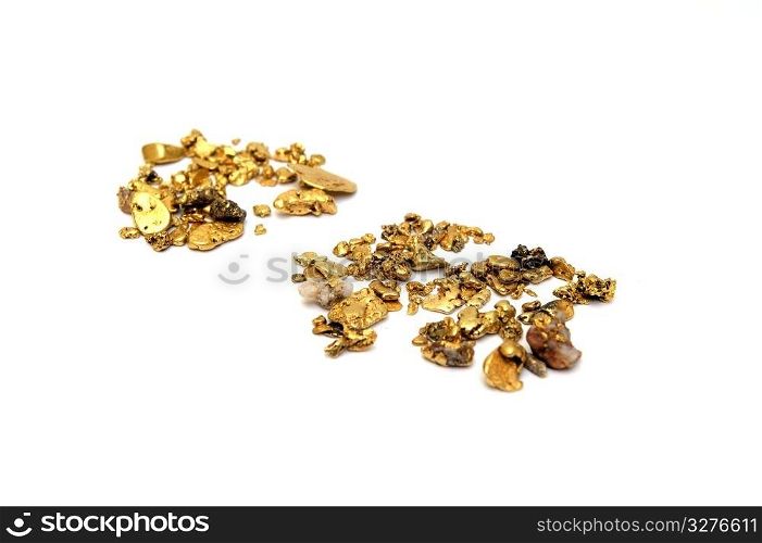 Gold Nuggets. Gold in nugget form mined from the rivers and streams of California insolated on white