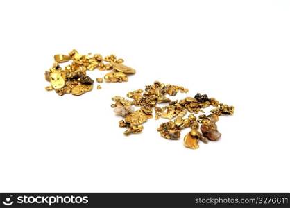 Gold Nuggets. Gold in nugget form mined from the rivers and streams of California insolated on white