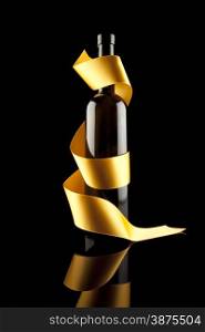 Gold ribbons around bottles