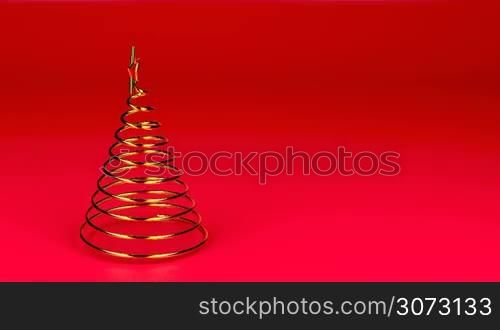 Gold spiral Christmas tree spin on red background
