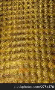 Gold texture. Detailed finely scaly metal surface