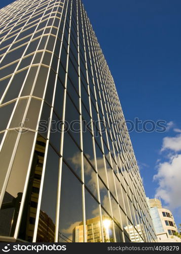 Gold tinted office building in the buisness district.