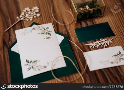 gold wedding rings as an attribute of a young couple’s wedding