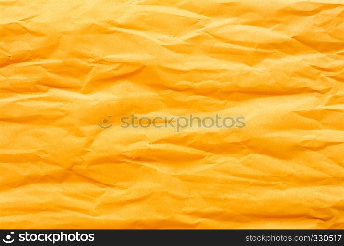 Gold yellow crumpled paper for background.