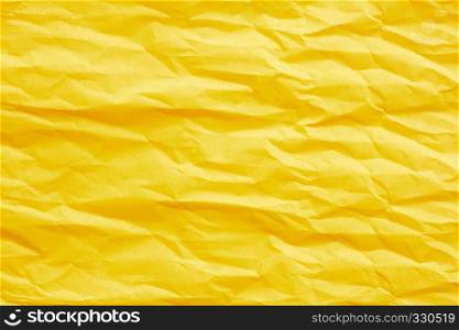 Gold yellow crumpled paper for background.