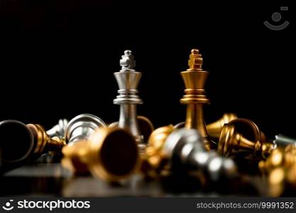 Golden and Silver King chess is last standing in the chess board, Concept of successful business leadership, Confrontation and loss