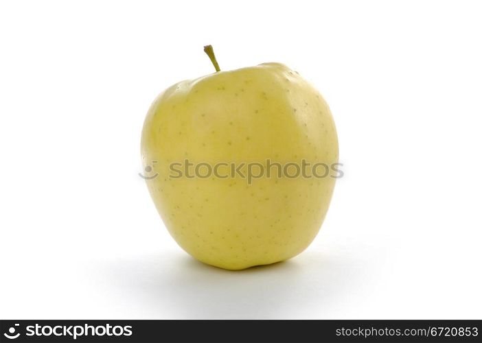 Golden apple on white background