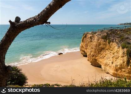 Golden beaches and sandstone cliffs near Albufeira, South Portugal.