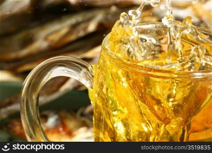 golden beer splash in glass