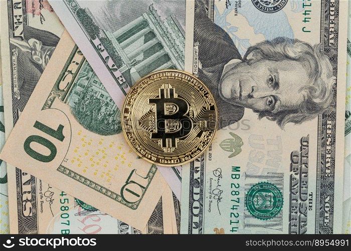 Golden bitcoin coin on a paper dollars money. Virtual  crypto currency. currency.