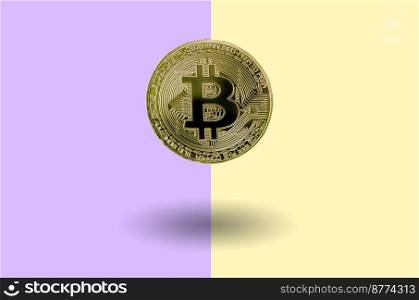 Golden bitcoin floating in background of pastel lilac and peach background. Cryptocurrency hard fork concept. Cryptocurrency hard fork concept. Floating Golden bitcoin