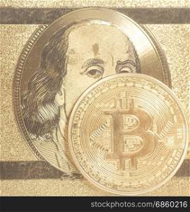 Golden bitcoin with U.S. dollar close up