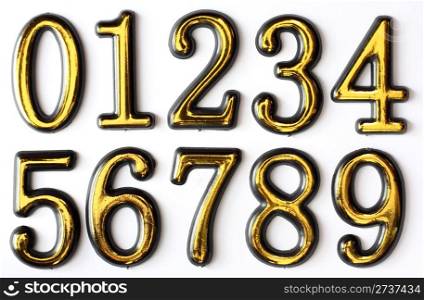 Golden bright numbers on a white background. Numbers 0, 1, 2, 3, 4, 5, 6, 7, 8 and 9.