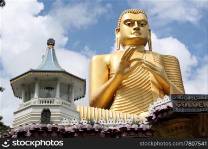 Golden Buddha and temple in Dambulla, Sri Lanka