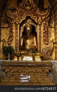 Golden Buddha in buddhist monastery, Nysaungshwe, Myanmar
