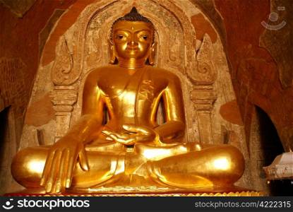 Golden Buddha in buddhist temple in Bagan, Myanmar