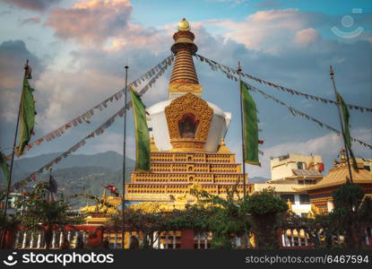 Golden Buddha in Kathmandu on a background of the Himalayas mountains