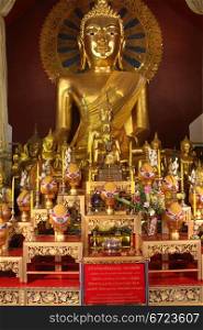 Golden buddha in temple, wat Phra Singh in VChiang Mai, Thailand