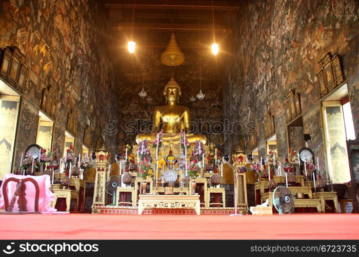 Golden Buddha in temple, wat Suthat, Bangkok, Thailand