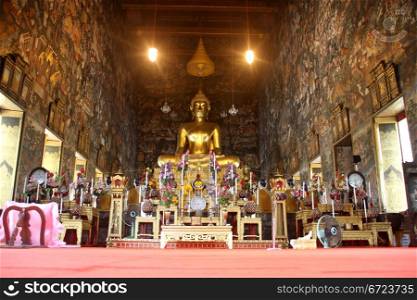 Golden Buddha in temple, wat Suthat, Bangkok, Thailand