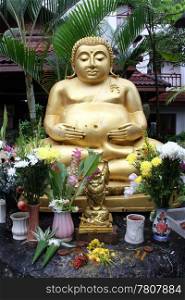 Golden Buddha in the buddhist monastery in Chiang Rai, Thailand