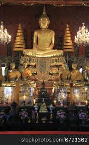Golden Buddha in Wat Suwandararam Rajawaraviharn in Ayutthaya, Thailand