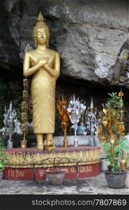 Golden Buddha on the Chomsey hill in Luang Prabang, Laos