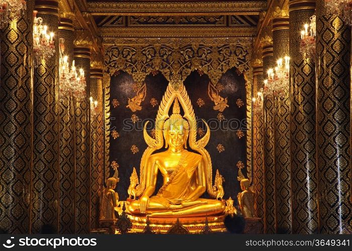 golden buddha statue image in Phisanulok Temple Thailand