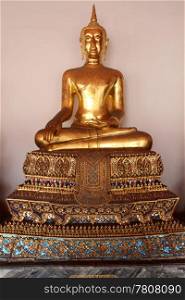 Golden Buddha statue in temple, wat Pho, Bangkok, Thailand